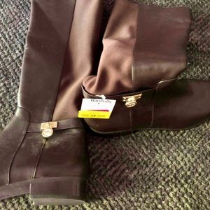 Brown Michael Kors boots.
